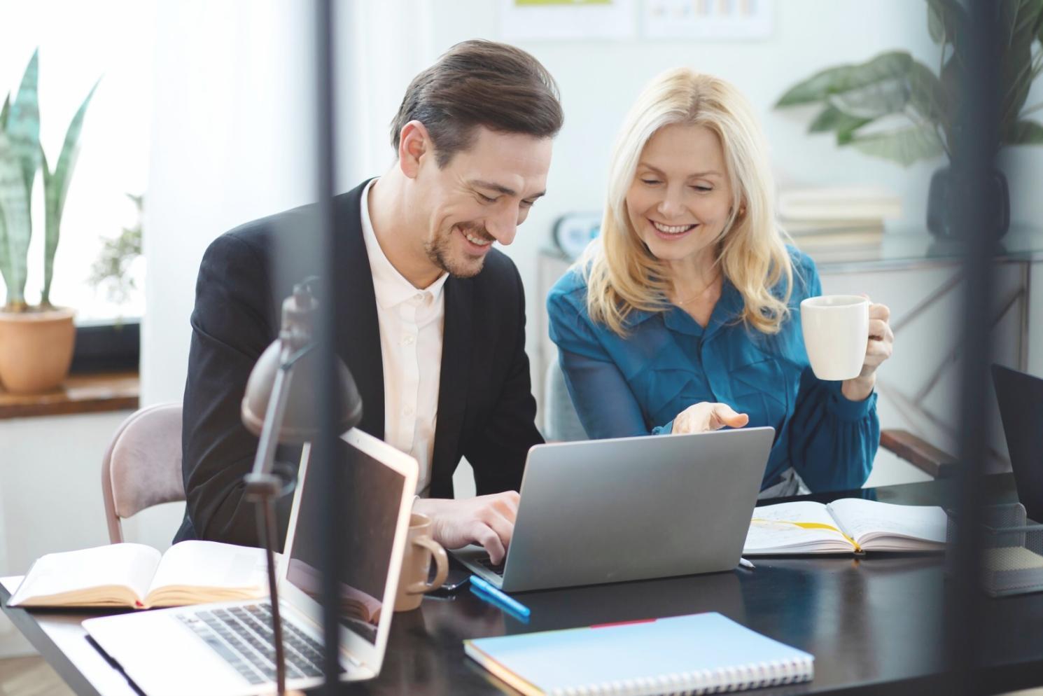 Professional training environment with participants engaged in departmental budgeting workshop